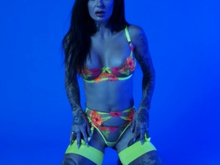 MILF slips out of her sexy neon lingerie